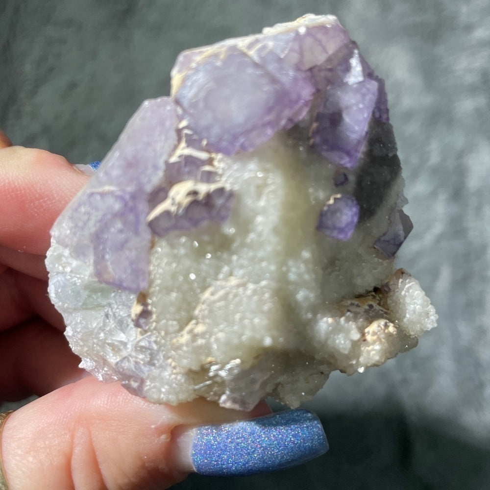 Crystal- sugar calcite- purple fluorite