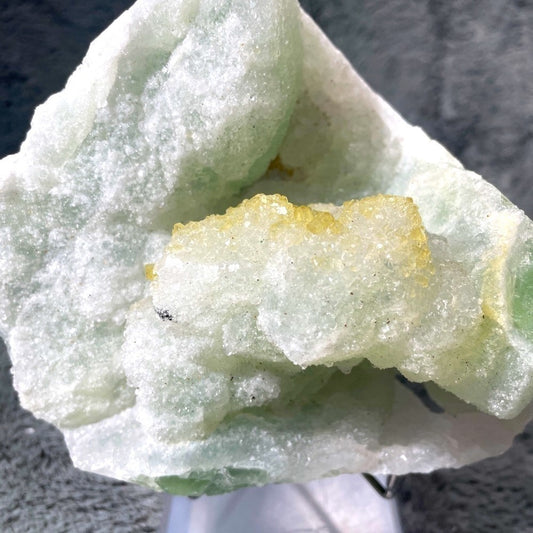WOWZA- raw crystal Green fluorite covered in sugar, yellow sugar, STRONG UV 6”x6